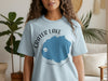 Light blue t-shirt with Crater Lake Oregon map and compass design.
