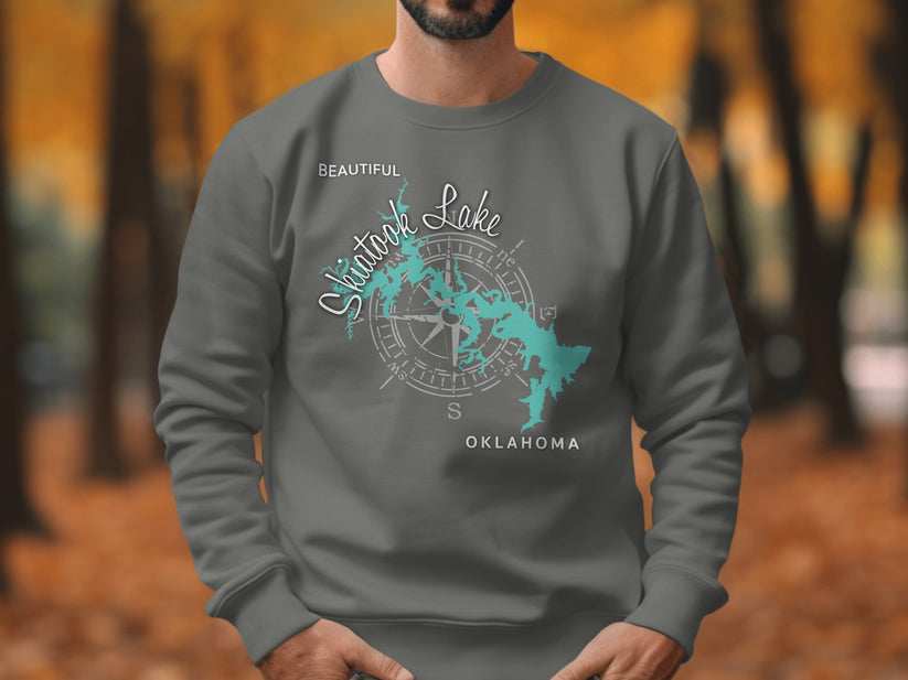 Grey sweatshirt with "Beautiful Skitook Lake Oklahoma" and a compass rose design.