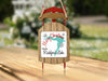 Sled ornament with "Merry Christmas From Rushford Lake" and lake silhouette.