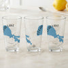 Three clear glasses with blue map of Clear Lake, California and compass rose designs.