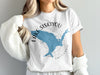 White t-shirt with blue Lake Siskiyou California graphic and compass rose.