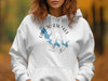 White hoodie with "Lake To Toesekee Georgia" and compass rose design.