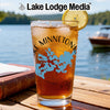 Glass of iced tea with a lemon slice, featuring Lake Minnetonka map and logo.