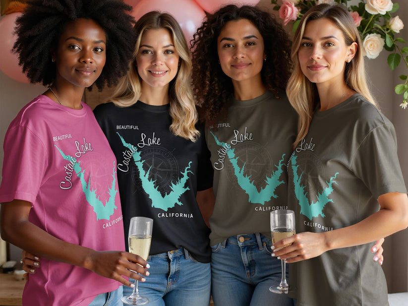 Four women in t-shirts with "Castaic Lake California" design and nautical compass.