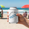 White koozie on can with "Douglas Lake Tennessee" and map design, held on a beach.