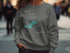Gray sweatshirt with "Beautiful Cedar Lake Ontario" text and compass graphic.