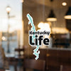 Kentucky Life sticker with a turquoise outline of Kentucky overlaid on black text.