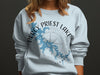 Light blue sweatshirt with Percy Priest Lake map and compass graphic.