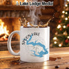 White mug with Spoon Lake Illinois map and compass, steaming hot coffee splashing.