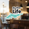 Big Bear Life sticker with teal lake outline and copyright text, applied to glass.