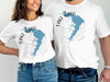 White t-shirts with blue Lake Waco map and compass graphic.