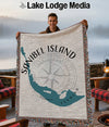 Man holding woven throw with Sanibel Island outline and "FLORIDA" text.