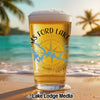 Beer glass on beach with "MS FORD LAKE" and compass design.