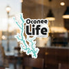 Oconee Life sticker with a turquoise outline of a lake shore.