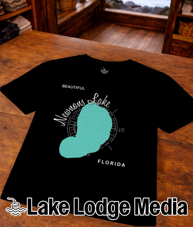 Black t-shirt with turquoise Lake Okeechobee outline, "Beautiful Navanous Lake Florida" text.