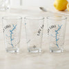 Three clear glasses with Lay Lake Alabama map and compass design.