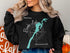 Black sweatshirt with a compass rose and the words "Beautiful Banks Lake Washington".