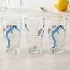 Three clear glasses featuring a blue map of Lake Jacomo and compass rose design.