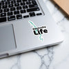 Sticker with Kentucky outline and "Kentucky Life" text on laptop keyboard