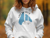 White hoodie with blue Lake Manawa Iowa graphic and compass design.