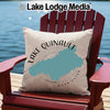 Pillow with Lake Quinault map and Washington text on a chair by the water.