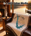 Throw blanket with Castaic Lake map and compass design, California.