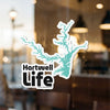 Hartwell Life sticker with turquoise lake outline and copyright text.
