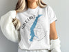 White t-shirt with Yale Lake map, compass, and Washington text graphic.