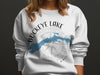 White sweatshirt with "Buckeye Lake Ohio" text, map, and compass rose graphic.