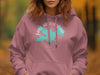 Pink hoodie with teal Lake Arrowhead California map and compass design.