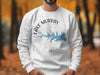White sweatshirt with Lake Murray, South Carolina map and compass design.