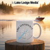 White mug with "Lake Guntersville Alabama" and compass design on a lake background.