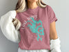 Pink t-shirt with "Lake Tapps Washington" text and aqua map graphic.