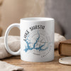 White mug with Lake Shasta map and compass design, "Lake Shasta California" text.