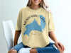 Yellow t-shirt with blue Mendenhall Lake shape and "ALASKA" text.
