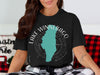 Black t-shirt with Lake Winnebago, Missouri design and compass rose graphic.