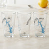 Three clear glasses with Falcon Lake map and compass design.