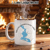 White mug with Mooselookmeguntic Lake map and compass design.