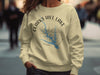 Light yellow sweatshirt with Clarks Hill Lake map and compass graphic.