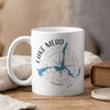 White mug with Lake Mead map and compass design, steaming hot.