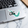 Castaic Life sticker on a laptop keyboard with a marble background.