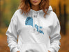 White hoodie with blue map graphic and "Clear Lake California" text.