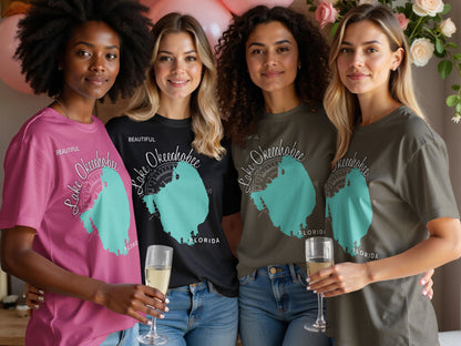 Four women wearing t-shirts with a map of Lake Okeechobee, Florida.