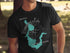 Black t-shirt featuring a teal map of Broadway Lake, South Carolina, with compass graphic.