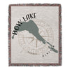 Woven throw blanket featuring Bow Lake Alberta map and compass design.