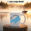 White mug with "Lake Quinault Washington" and compass design.