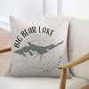 Pillow with Big Bear Lake map graphic and compass rose on chair.