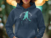 Navy blue hoodie with a turquoise map and compass graphic.