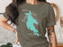 Turquoise map of Newfound Lake, New Hampshire on a dark olive t-shirt.