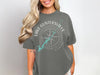 Gray t-shirt with white text "LAKE GUNTERSVILLE ALABAMA" and compass graphic.